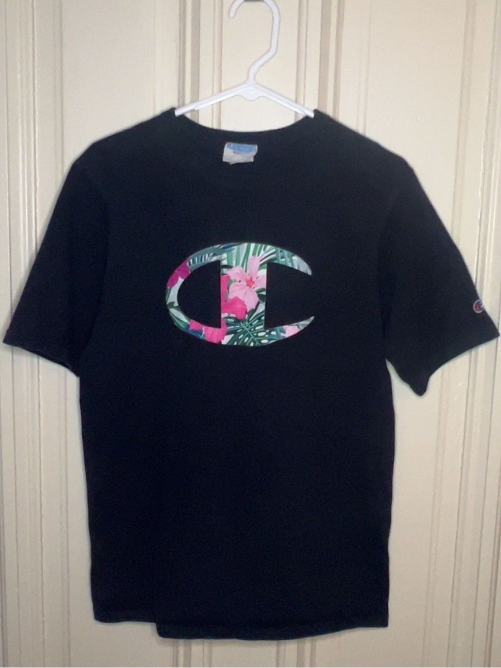 Champion Black Tee with Tropical Floral Logo